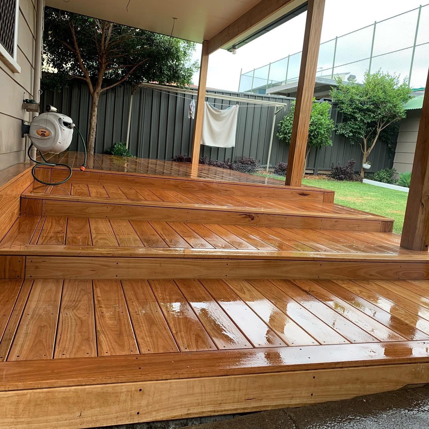 A completed timber deck overlooking a Hunter Valley backyard